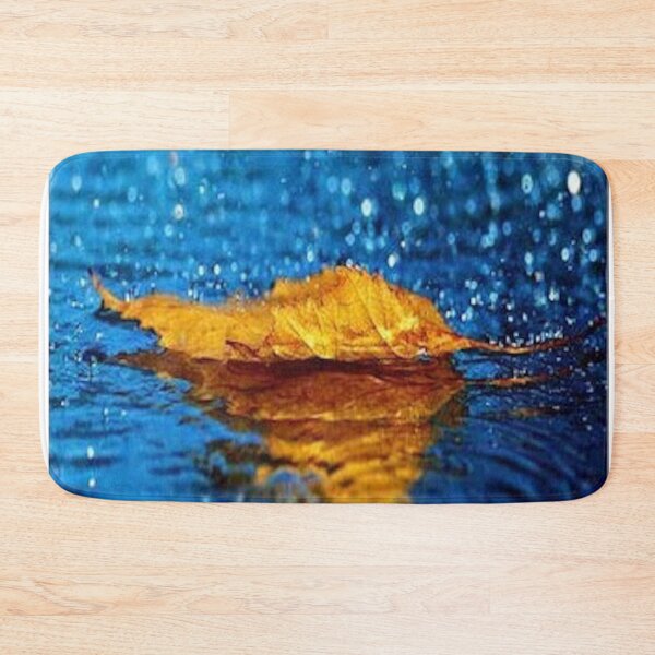 Item preview, Rain falling on an autumn leaf with reflection - blue & gold color bokeh pattern designed and sold by MindChirp.