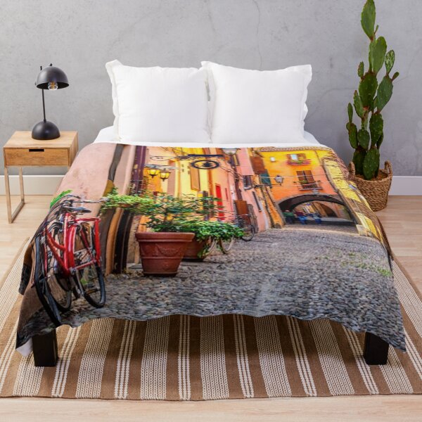 Item preview, Sunny cobble stone street in Italy with red bicycle designed and sold by MindChirp.