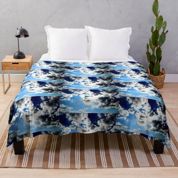 Item preview, Peaceful scenery with powerful sunbeams making their way through fluffy clouds in the blue sky designed and sold by Kristina Drozd.