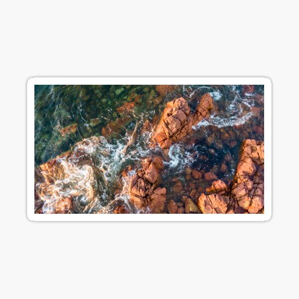 Waves Crashing Over the Rocky Beach Sticker