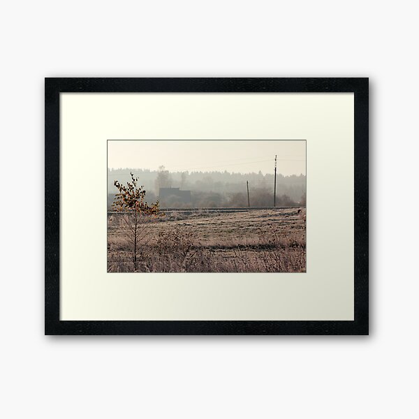 Village in morning mist at autumn time Framed Art Print