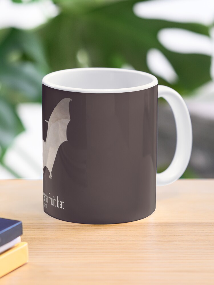 Thumbnail 1 of 6, Coffee Mug, Little Mariana fruit bat - Endangered and extinct species (dark background) designed and sold by 12images.