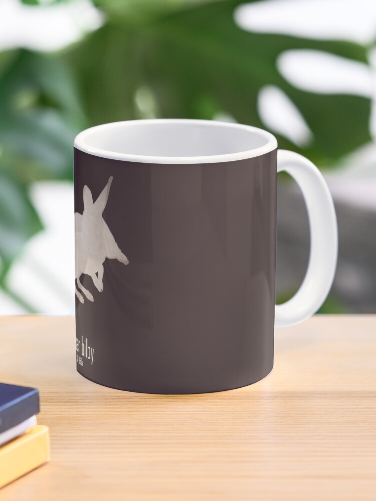 Thumbnail 1 of 6, Coffee Mug, Lesser bilby - Endangered and extinct species (dark background) designed and sold by 12images.