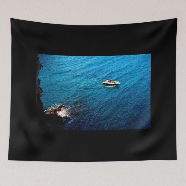Item preview, View from a high rocky shore of Polignano a Mare at a boat in the Adriatic sea designed and sold by Kristina Drozd.