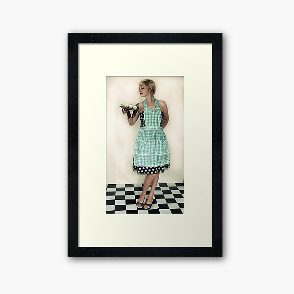 Pin Up Housewife on checkered floor Framed Art Print