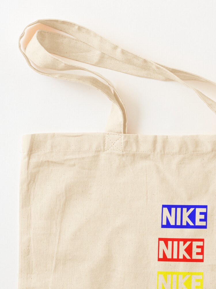 NIKE Tote Bag by kirantaiale