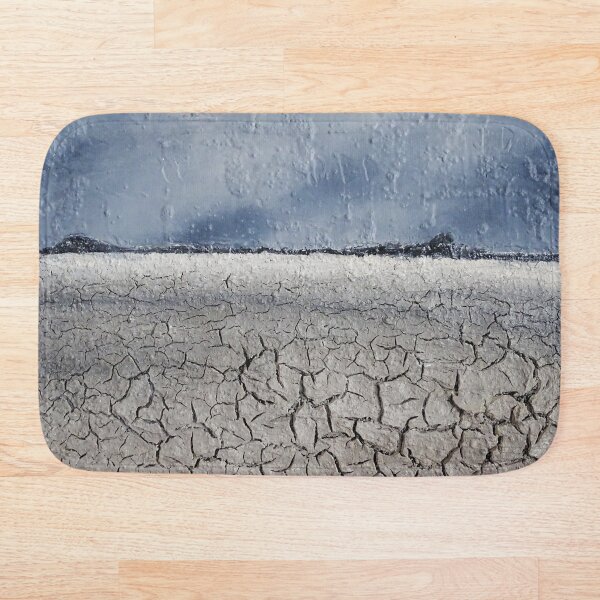 Cracked desert / mixed media painting Bath Mat