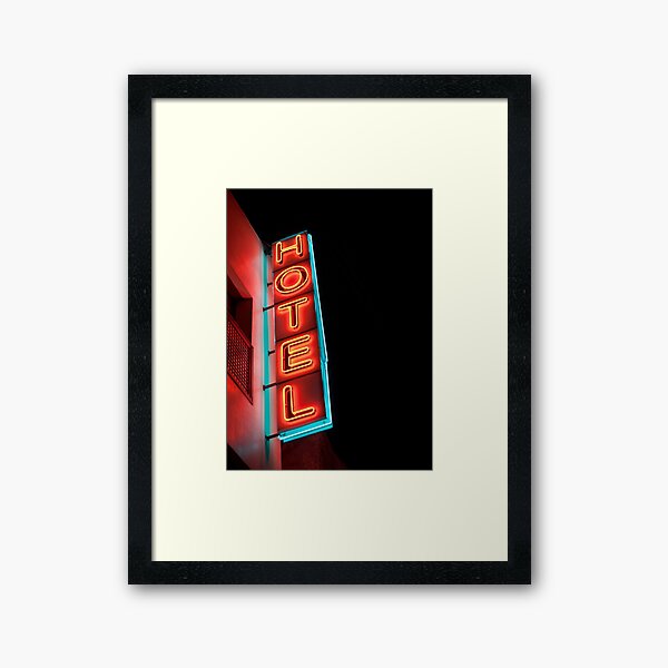 The colorful neon sign of Hotel Jnane Sbile in Fes, Morocco. Framed Art Print