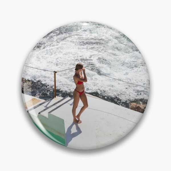 Item preview, a couple posing for photographs at Bondi icebergs pool designed and sold by justine Gordon.