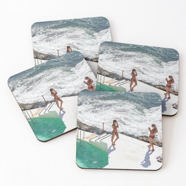 Item preview, a couple posing for photographs at Bondi icebergs pool designed and sold by justine Gordon.