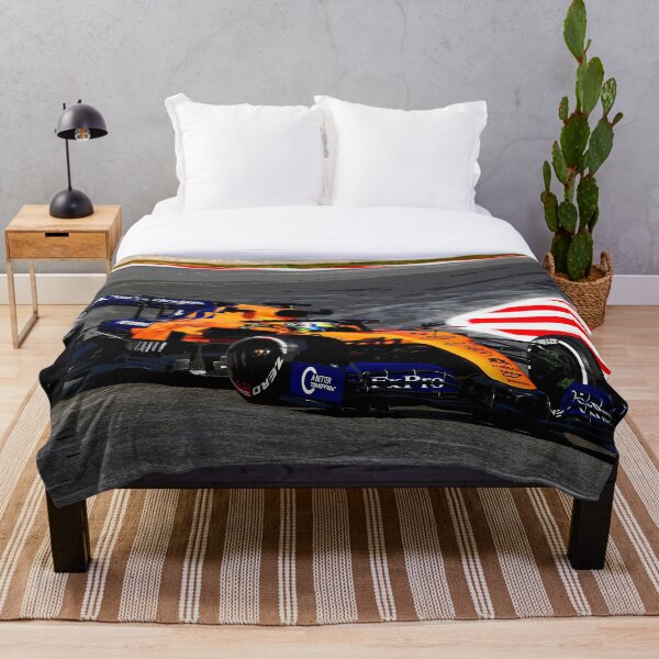 Lando Norris au volant de sa Formule 1 2019 Plaid