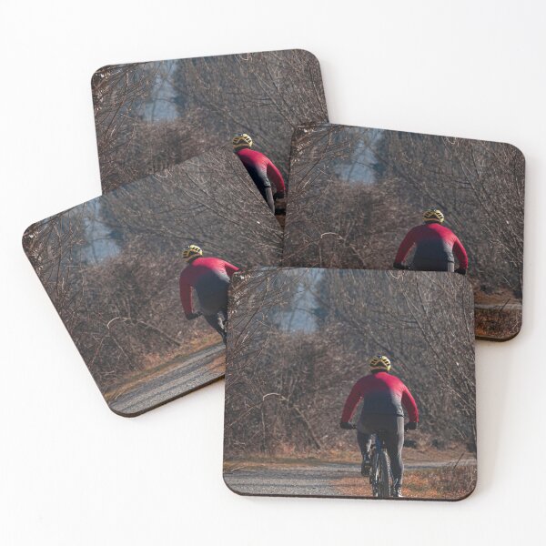 Item preview, Rear view of a cyclist riding his mountain bike on a path in nature designed and sold by brambillasimone.