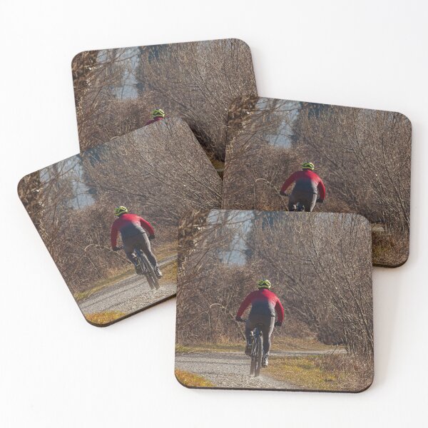 Item preview, Rear view of a cyclist riding his mountain bike on a path in nature designed and sold by brambillasimone.