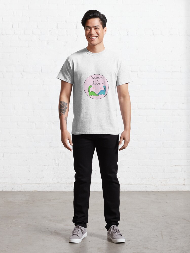 Disover Dinosaurs in Love - Pink Background Classic T-Shirt