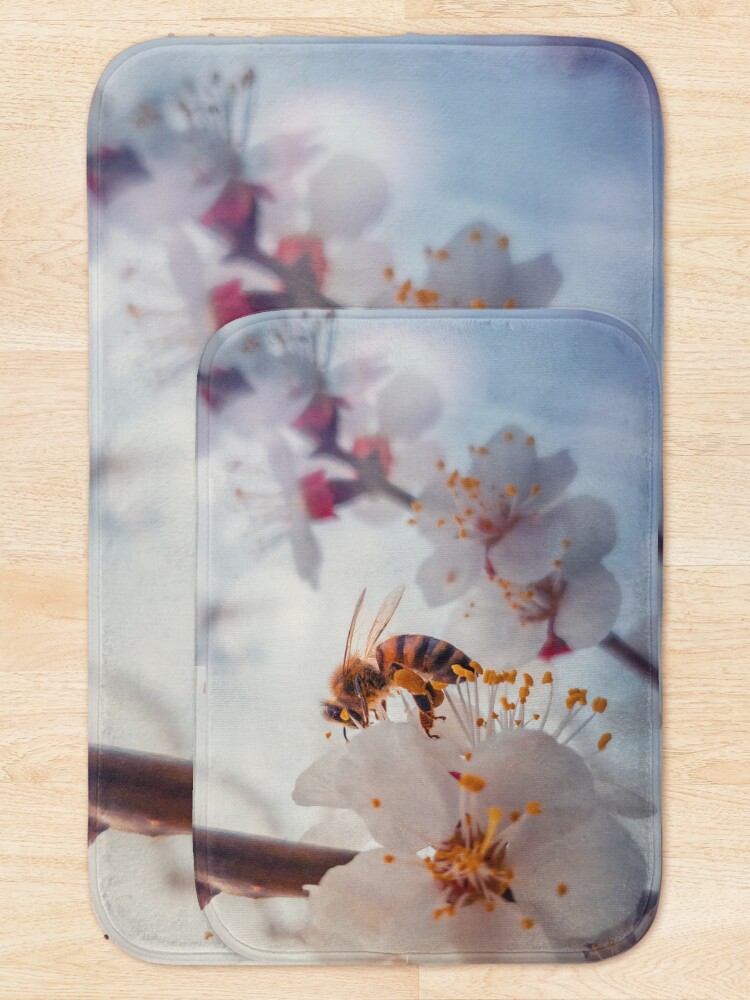 Alternate view of honey bee on apricot flowers Bath Mat