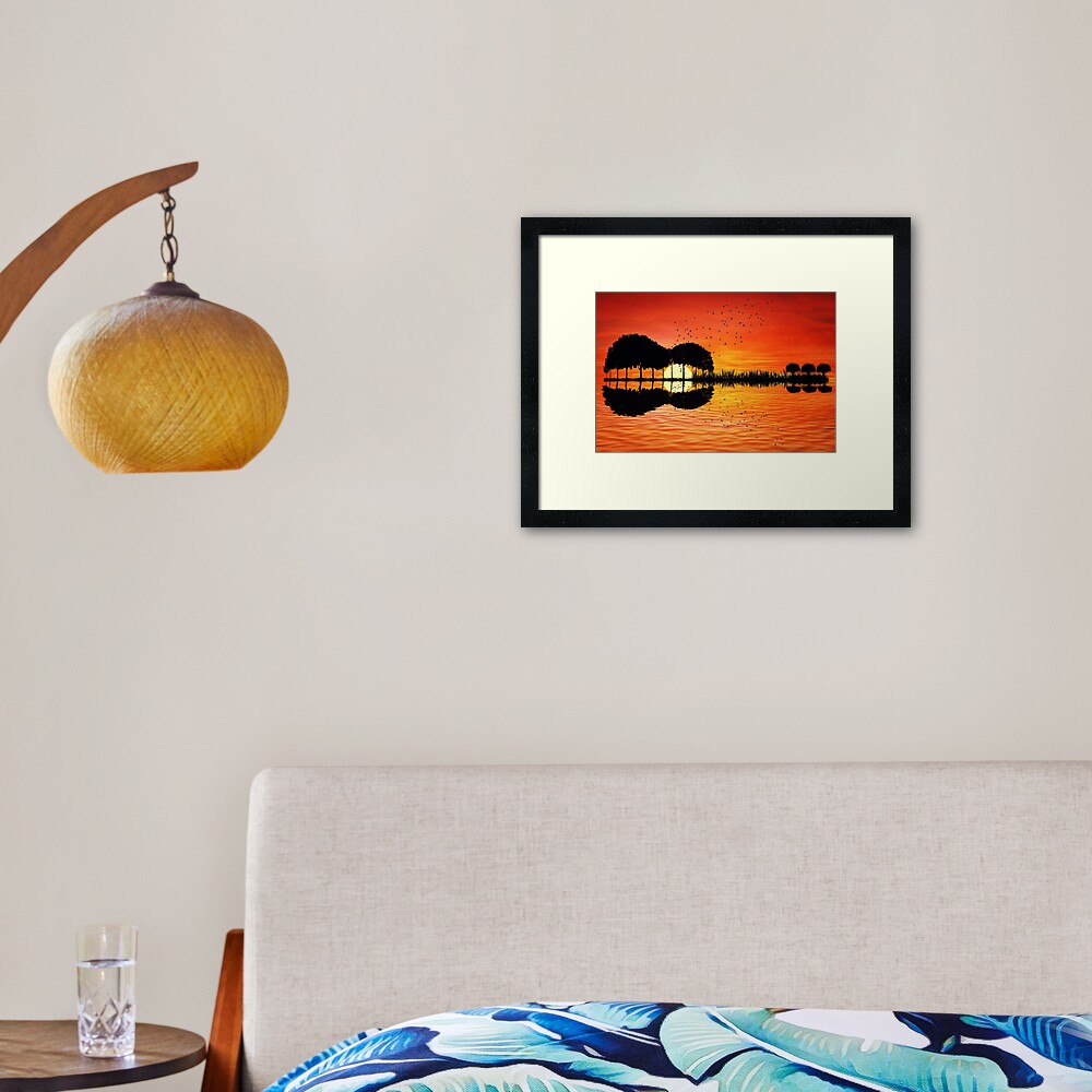 guitar island sunset Framed Art Print