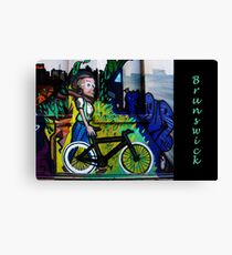 Images of Brunswick #6 Street Art - Woman on Bike Canvas Print