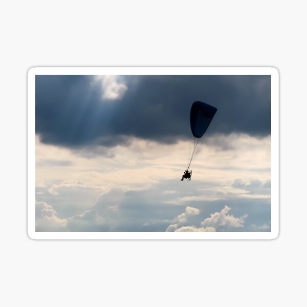 Powered Paraglider Flying in the Stormy Clouds Sticker