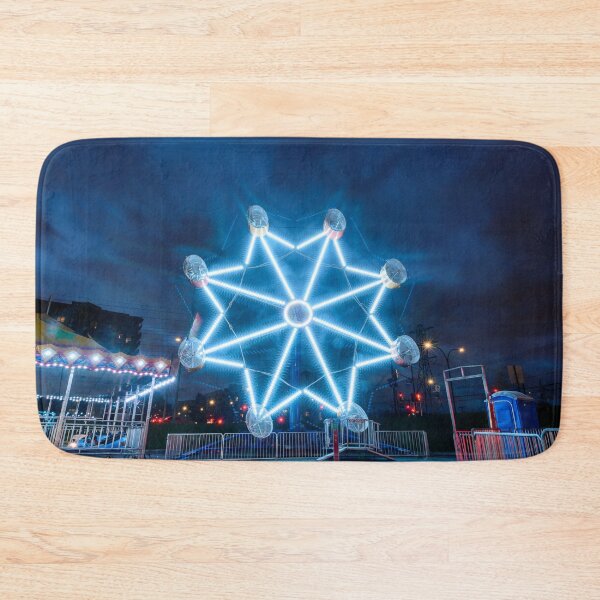 Item preview, Dramatic clouds behind Ferris Wheel designed and sold by RezieMart.
