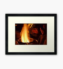Hands Warming by the Fire Framed Print