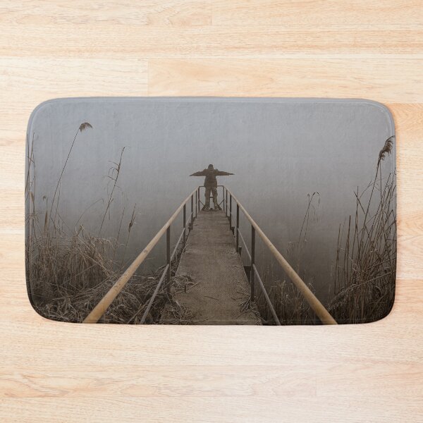Item preview, Man with open arms on a frozen pier shrouded in mist designed and sold by brambillasimone.