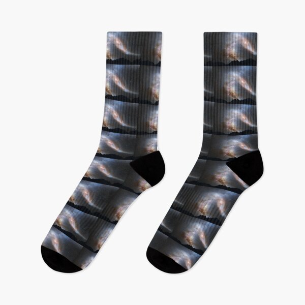 Item preview, Andromeda Galaxy in the night sky with mountain silhouettes  designed and sold by p0pculture3.