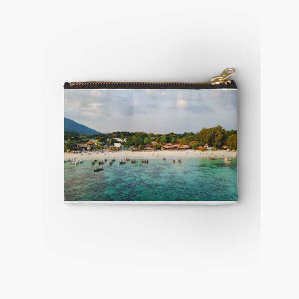 Item preview, Aerial view of long boats on soft sand in paradise  designed and sold by Ralphydoog.