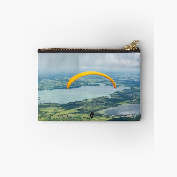Item preview, A paraglider flying over Forggensee and Bannwaldsee lakes in Bavaria, Germany designed and sold by AlizadaStudios.