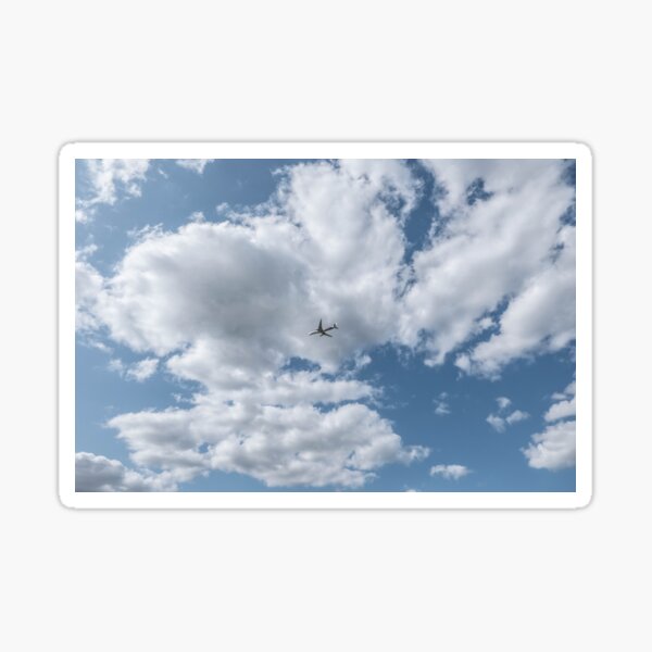 airplane, blue sky and clouds Sticker