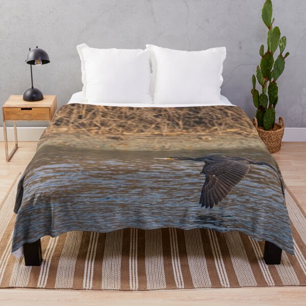 Item preview, The great cormorant flies at water level over a river designed and sold by brambillasimone.