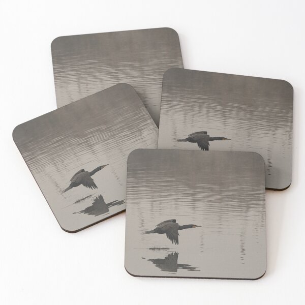 Item preview, The great cormorant flies at water level over a river designed and sold by brambillasimone.