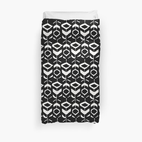 White flower pattern on a black background Duvet Cover