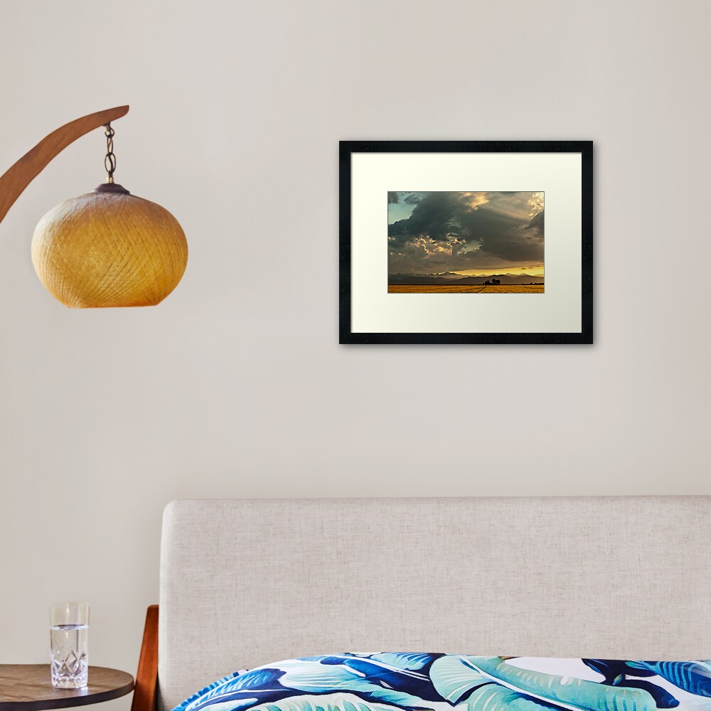 Sunset and Turmoil Framed Art Print