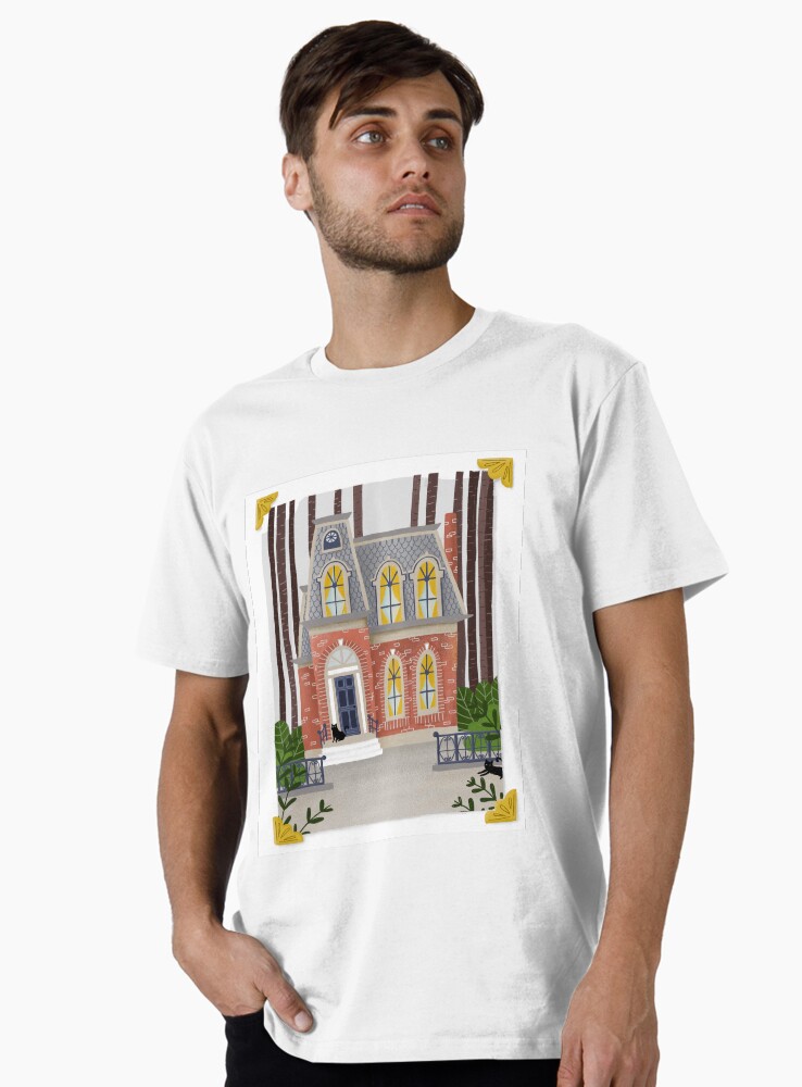 Imagen 1 de 4, Camiseta premium con la obra Pequeña casa antigua con gatos negros, diseñada y vendida por paulahurtado.