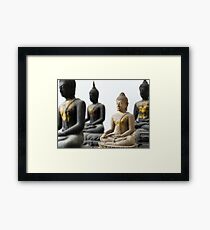 Light Stone Buddha focus and Three Dark out Framed Print
