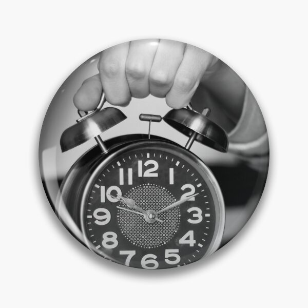 Item preview, black and white closeup woman holding alarm clock showing ten o'clock designed and sold by sigoisette.