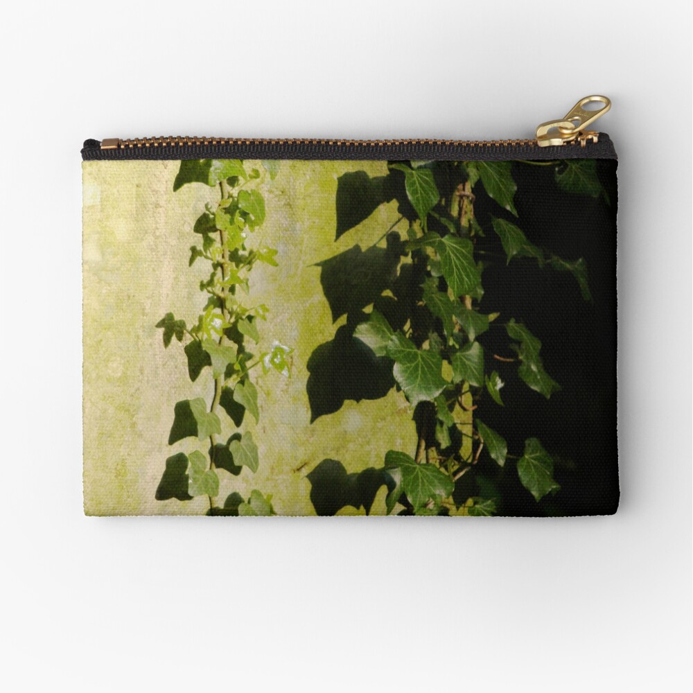 Trailing ivy on grave Zipper Pouch
