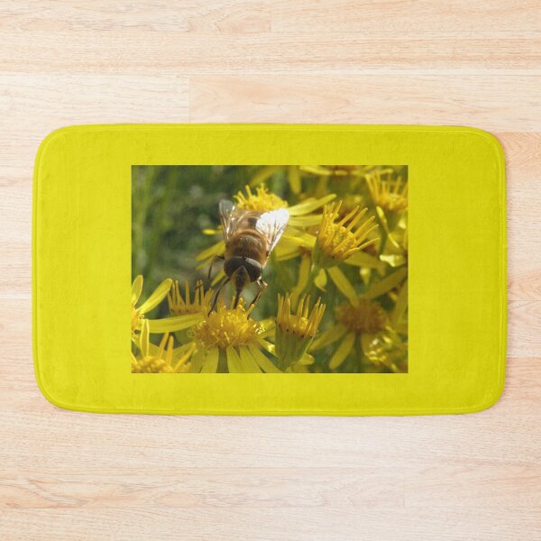 Item preview, Hoverfly Feeding on Yellow Flowers Photograph designed and sold by naturegallery.