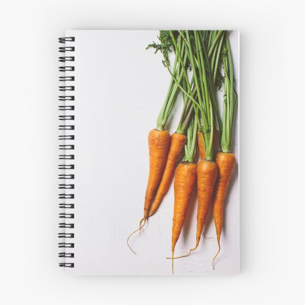 Item preview, Bundle of young fresh carrots with green tops close-up designed and sold by dariazu.