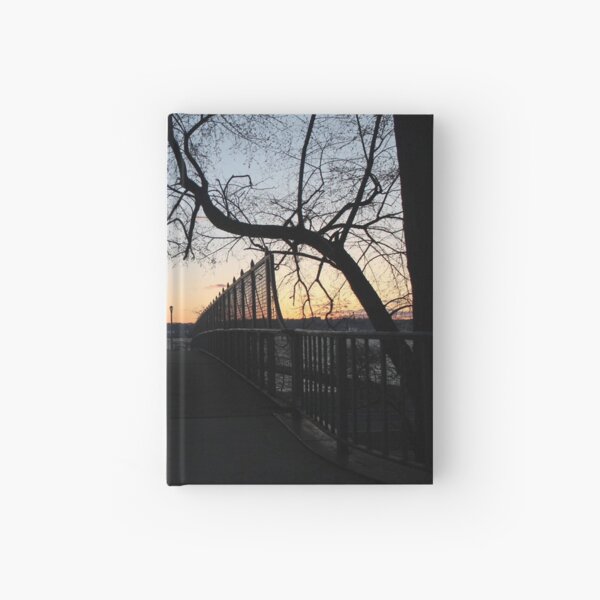 Sunset, also known as sundown, is the daily disappearance of the Sun below the horizon due to Earth's rotation Hardcover Journal