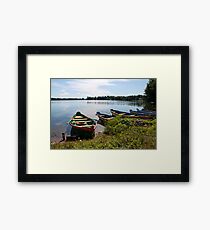 Boats on a lake Framed Print