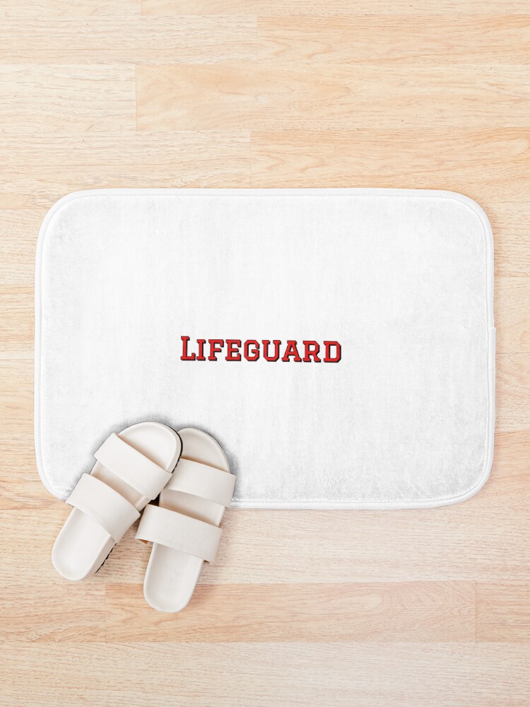 Thumbnail 1 of 6, Bath Mat, Lifeguard Sticker designed and sold by trqffic.