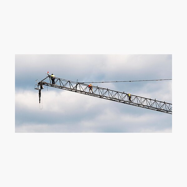 Riggers assembling a Construction Crane on Multistory Units. May11, 2019. Part of a series. Photographic Print
