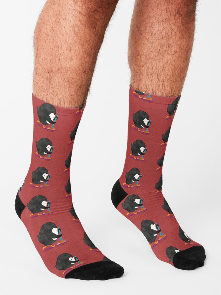Alternate view of Caesar doing some home chores Socks