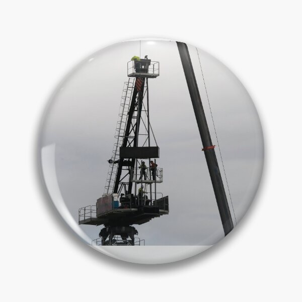 Item preview, Riggers assembling a Construction Crane on Multistory Units. May 5, 2019. Part of a series.  designed and sold by sunnypicsoz.