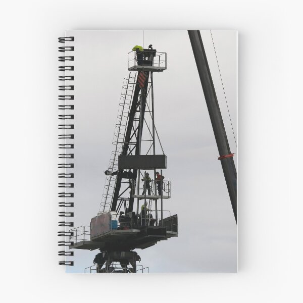 Item preview, Riggers assembling a Construction Crane on Multistory Units. May 5, 2019. Part of a series.  designed and sold by sunnypicsoz.
