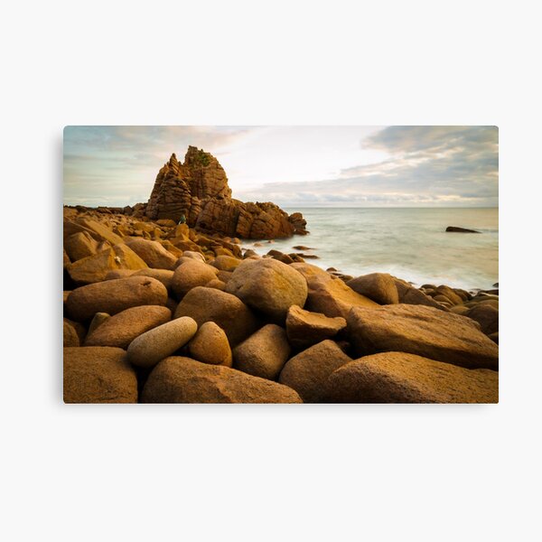 Item preview, Slow moving waves crashing on a beach with mysterious rock formations designed and sold by DesignBoard Photography.