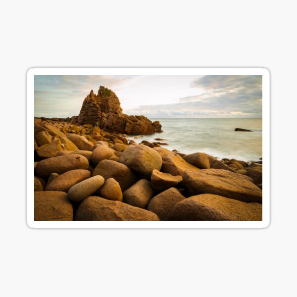 Item preview, Slow moving waves crashing on a beach with mysterious rock formations designed and sold by DesignBoard Photography.