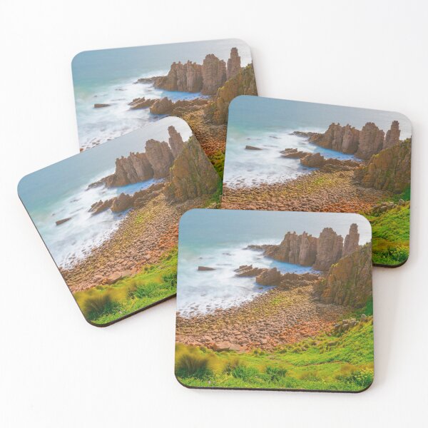 Item preview, Slow moving waves crashing on a beach with mysterious rock formations designed and sold by DesignBoard Photography.