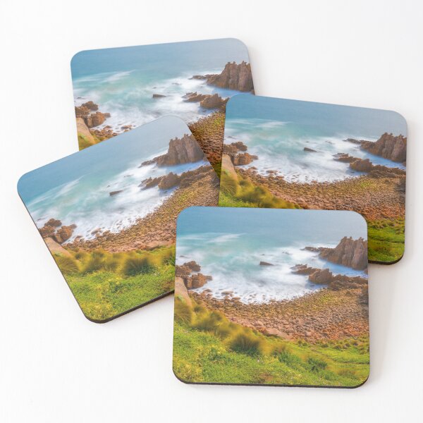 Item preview, Slow moving waves crashing on a beach with mysterious rock formations designed and sold by DesignBoard Photography.